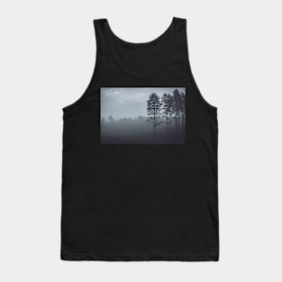 Mystery pine forest covered with fog Tank Top